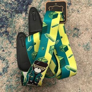 NWT  IKARIKUMA Angry Little Black Bear Guitar Strap leather ends
